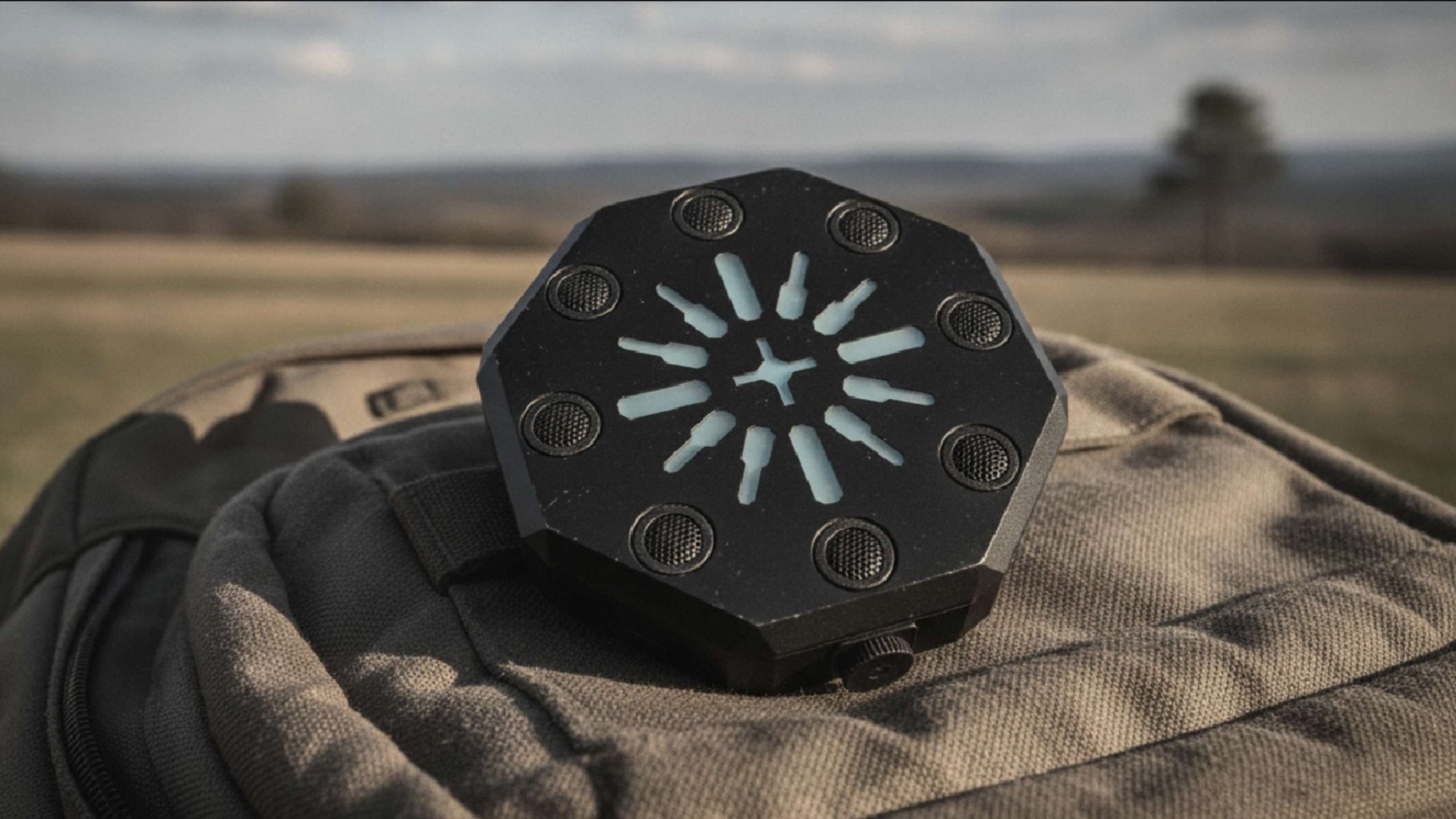 AcuSync passive acoustic node resting on a field pack