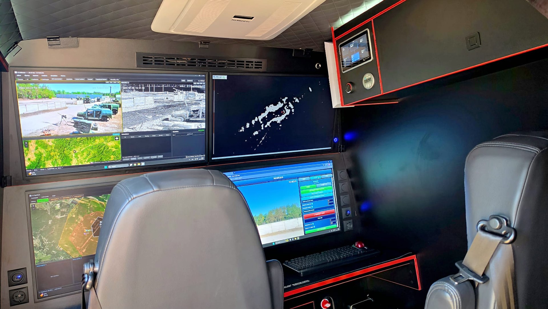 C2 Defender operator console with live sensor feeds, map and track displays