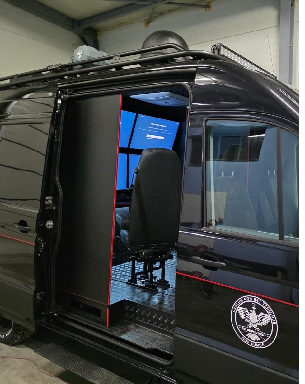 C2 Defender — Operator position, side door open