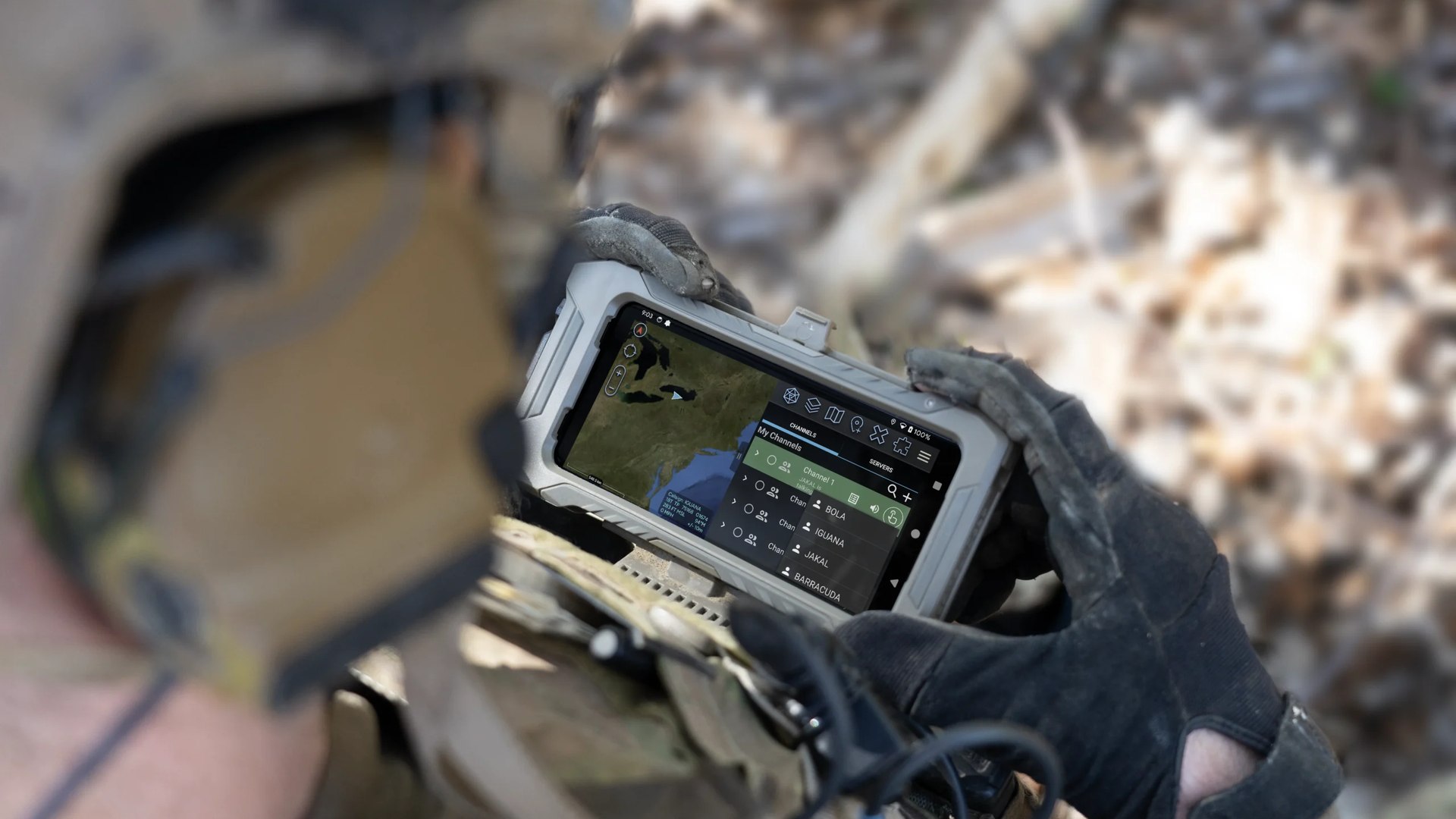 Operator working the C4TAK common operational picture on a rugged handheld device